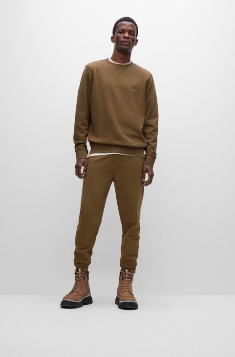 Hugo Boss σκούρο πράσινο βαμβακερό φούτερ χαλαρής εφαρμογής με έμπλαστρο με λογότυπο
