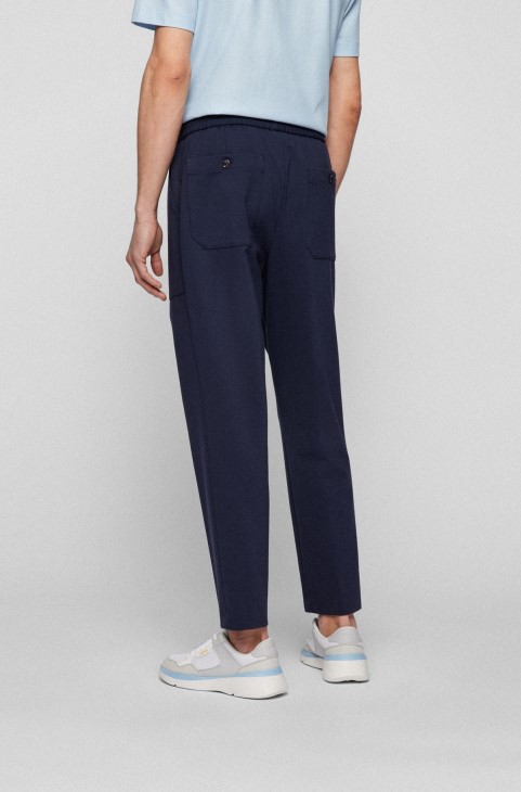 παντελόνι με κωνική εφαρμογή σε Stret Jersey σκούρο μπλε Hugo Boss
