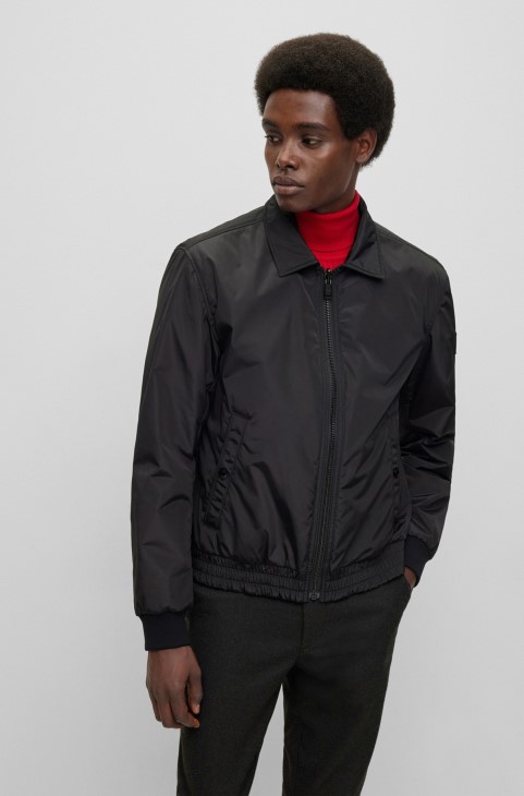 μαύρο αναστρέψιμο αδιάβροχο μπουφάν Hugo Boss με λογότυπο