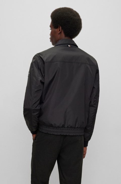 μαύρο αναστρέψιμο αδιάβροχο μπουφάν Hugo Boss με λογότυπο
