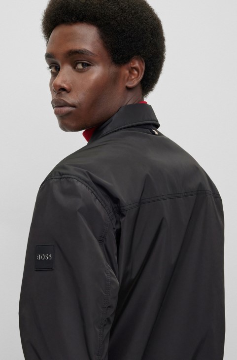 μαύρο αναστρέψιμο αδιάβροχο μπουφάν Hugo Boss με λογότυπο
