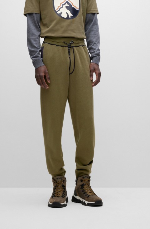ανοιχτό πράσινο παντελόνι φόρμας Hugo Boss με κανονική εφαρμογή από βαμβάκι και παρθένο μαλλί