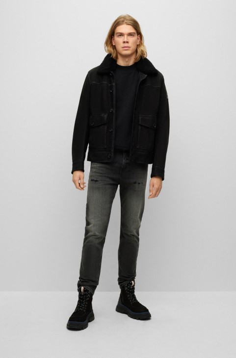 Hugo Boss κωνικό τζιν σε θείο-μαύρο Comfort-stretch μαύρο τζιν
