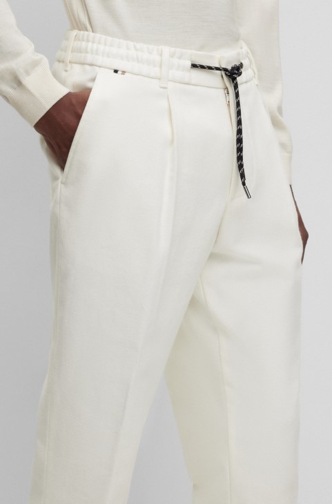 Παντελόνι Hugo Boss με κωνική εφαρμογή από καθαρό βαμβάκι με κορδόνι στη μέση λευκό
