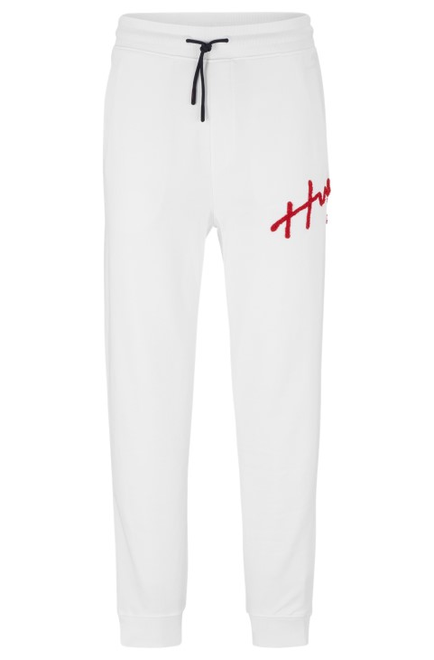 Παντελόνι φόρμας Hugo Boss λευκό βαμβακερό με χειρόγραφο κέντημα με λογότυπο
