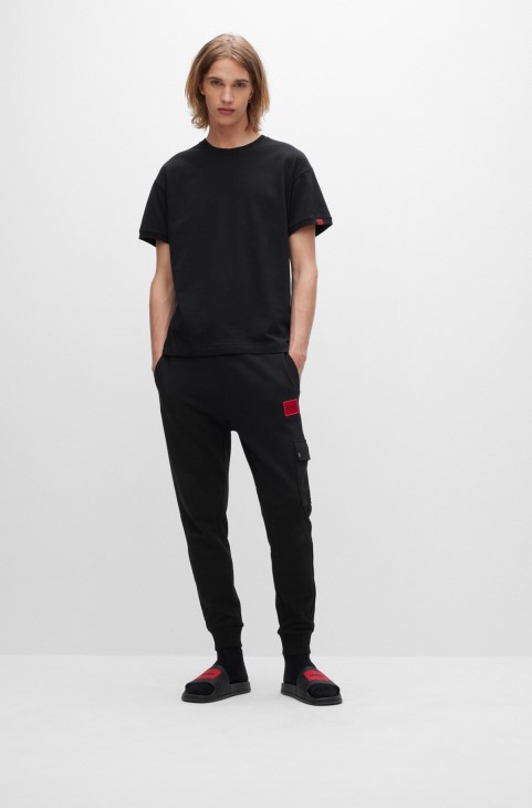 Μαύρο μπλουζάκι σαλονιού χαλαρής εφαρμογής από ελαστικό βαμβάκι με λογότυπο Hugo Boss
