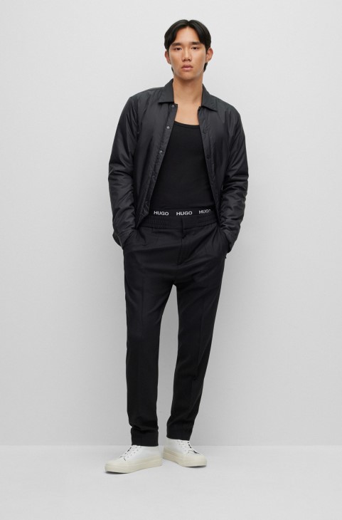 Μαύρο παντελόνι Hugo Boss με εξαιρετικά λεπτή εφαρμογή σε συνδυασμό μαλλί απόδοσης
