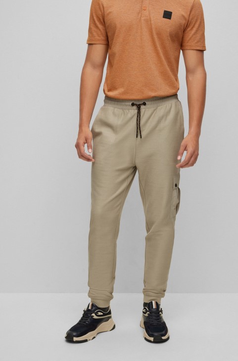 ανοιχτό γκρι παντελόνι Hugo Boss από βαμβακερή φόρμα με λογότυπο