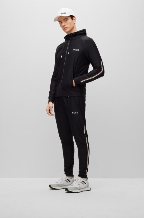 Hugo Boss X Matteo Berrettini λογότυπο παντελόνι αθλητικής φόρμας με χαρακτηριστικές ρίγες και στριφώματα με μανσέτες
