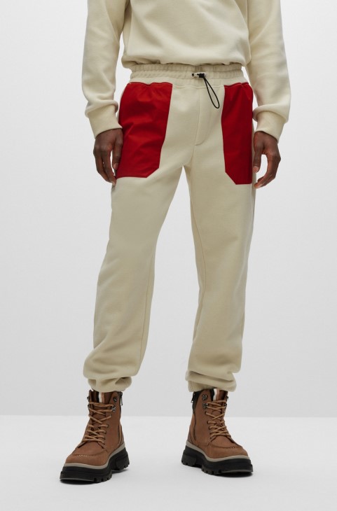 Παντελόνι φόρμας από βαμβακερό μείγμα Hugo Boss με μπεζ λογότυπο
