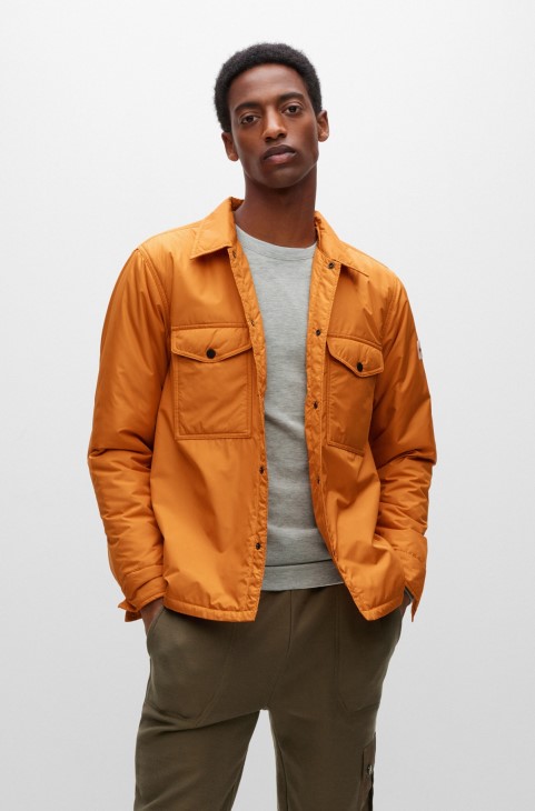 υδατοαπωθητικό μπλουζάκι μεγάλου μεγέθους με λαστιχένιο λογότυπο Hugo Boss ανοιχτό πορτοκαλί
