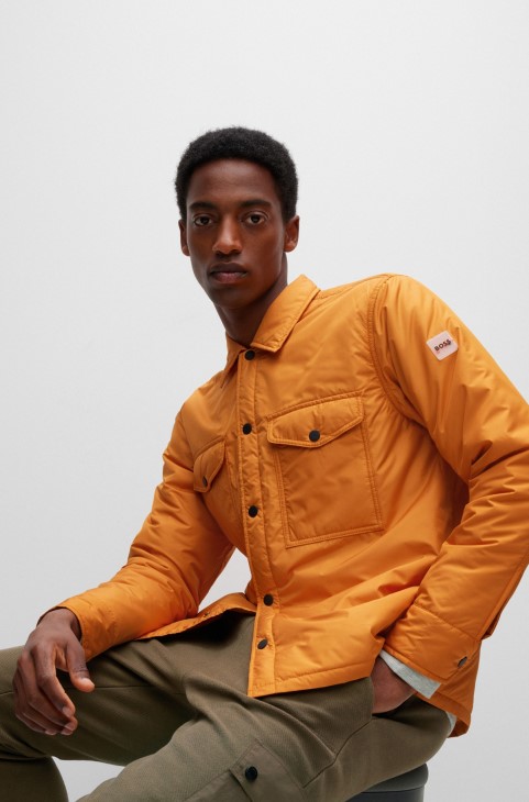 υδατοαπωθητικό μπλουζάκι μεγάλου μεγέθους με λαστιχένιο λογότυπο Hugo Boss ανοιχτό πορτοκαλί
