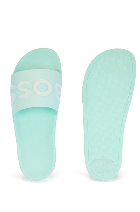 Hugo Boss ανοιχτό πράσινο διαφάνειες ιταλικής κατασκευής με λουράκι με λογότυπο αντίθεσης
