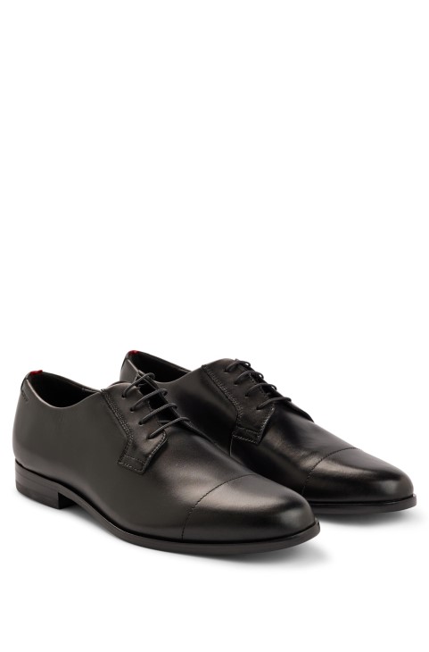 Παπούτσια ντέρμπι από γυαλιστερό δέρμα με λεπτομέρεια από το καπάκι σε μαύρο χρώμα Hugo Boss