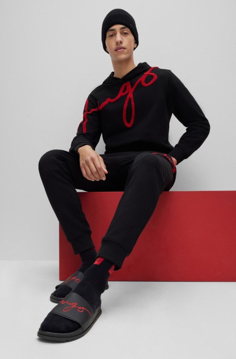 μαύρα λογότυπο διαφάνειες με περίγραμμα ποδιού Boss Hugo
