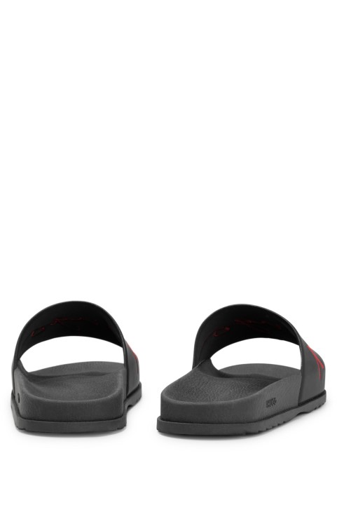 μαύρα λογότυπο διαφάνειες με περίγραμμα ποδιού Boss Hugo
