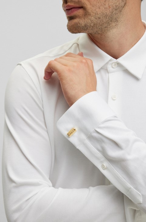 Μανικετόκουμπα με χρυσό θόλο με χαραγμένο λογότυπο σε χρυσό ατσάλι Hugo Boss
